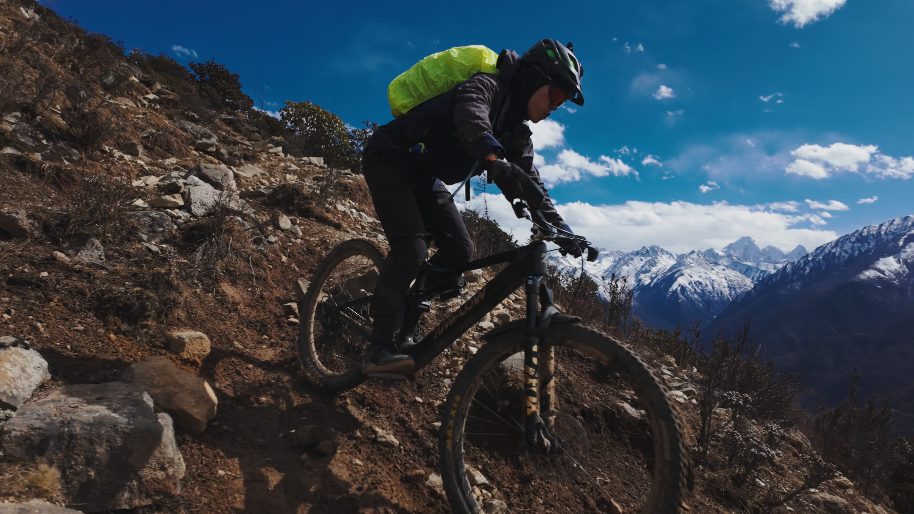 Mountain biker riding natural singletrack in Western Sichuan
